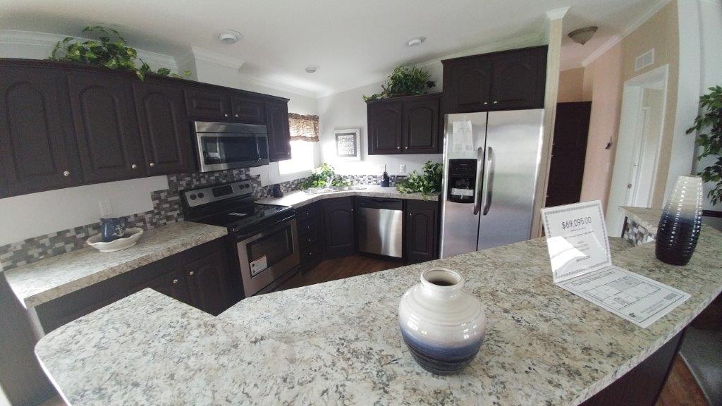The Brandon with optional kitchen Model Nobility Homes